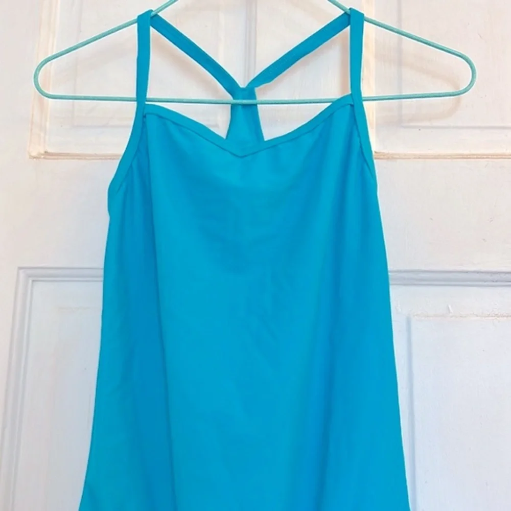 Girls Aqua Blue One-Piece Swimsuit with Cross-Back Straps in size 12
